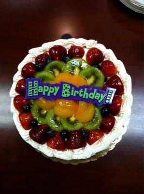 8" layered cake with assorted fruits