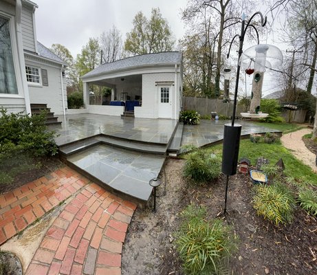 Natural stone patio construction. Beautiful Pennsylvania bluestone with landscape lighting (336)430-4287