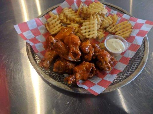 Our delicious wings and waffle fries.