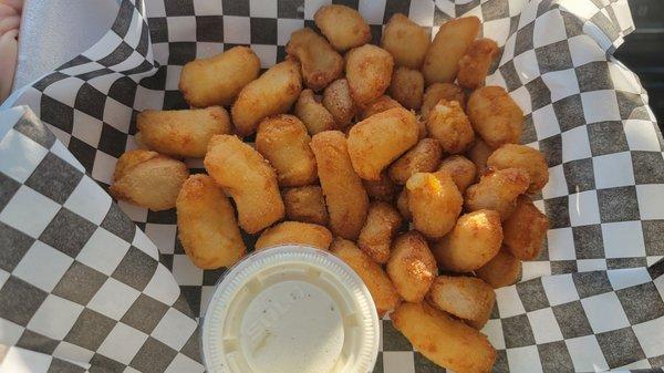 Cheese curds with a cornmeal-like breading