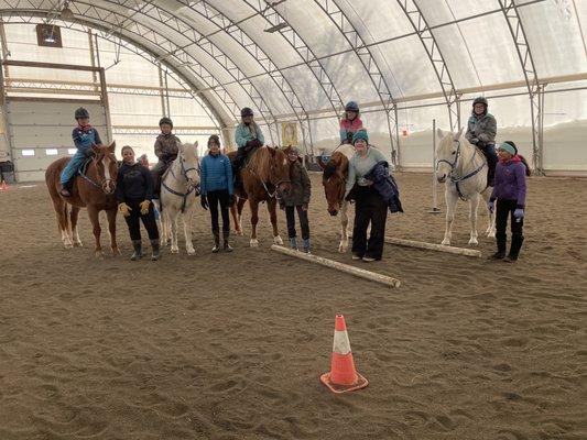 Naturally lit indoor riding arena.