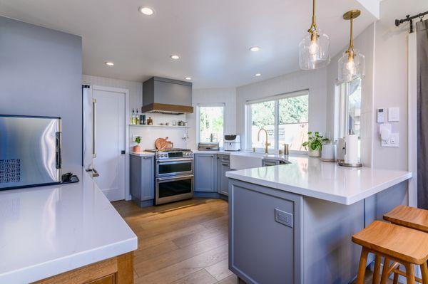 Granda Hills Two tone kitchen. We used Lectus cabinetry, and used Arizona tile quartz and back splash tile.