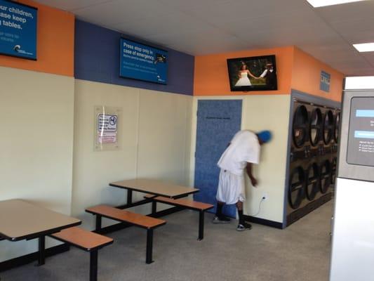 Waiting Area. Laundromat features flat screen TVs, and free wifi with login to your cable subscription.