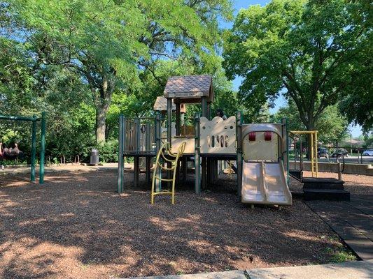 Playground area with swings.