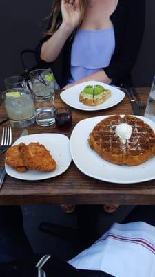 Chicken + waffles; in this case a pumpkin waffle with chai butter along with avacado toast