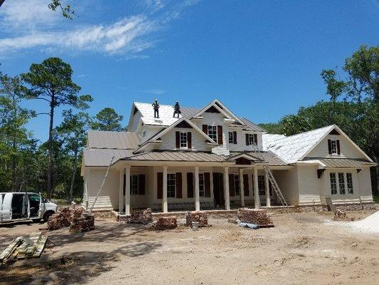 Standing Seam Metal Roof in the middle of installation.