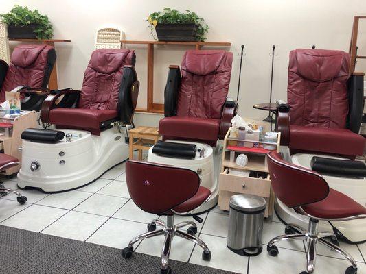 Massage chairs with foot basins