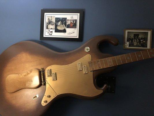 Humongous electric guitar in the music room