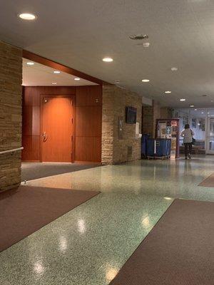 Hallway in front of theater.