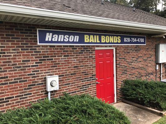 Back of Hanson Bail Bonds next to American Trade & Loan.