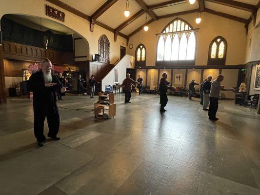 Tai Chi class, practicing the Hunyuan Taiji Regular 24 form.