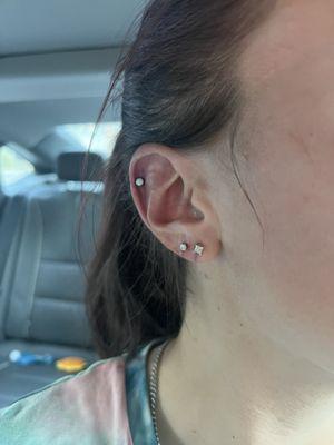 Right helix and second (round) earlobe piercing done by Jamie