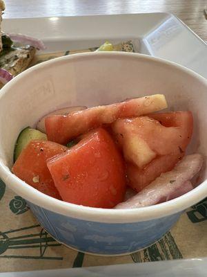 Almost empty cup of Tomato Cucumber Salad