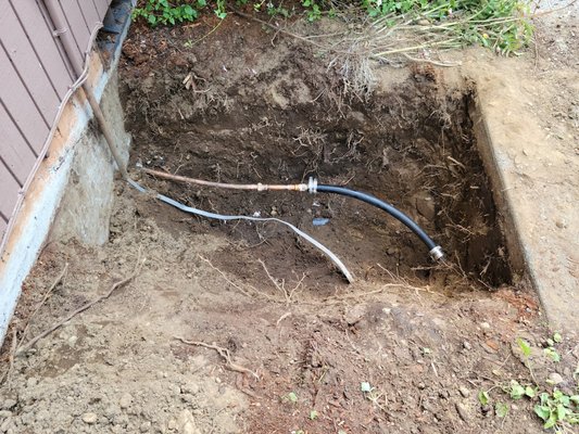 Located leak using leak detector in existing underground residential main water line and repaired.