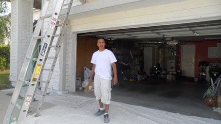 Mauricio Repairing Front House Before Painted