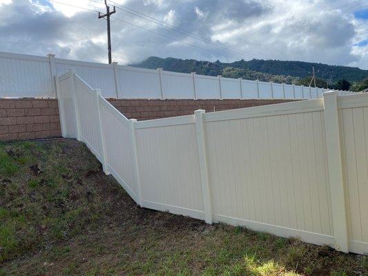 Same side of the fence connecting up to the top and matching subdivision fence.