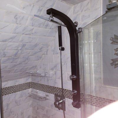 Banks first floor under stairs soap dish holders in shower.