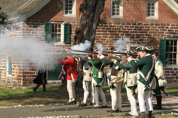 American Revolutionary War Reenactment at Historic New Bridge Landing. The Zabriskie-Steuben House (state-historic site) in the background.