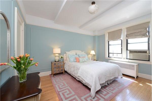 #TraditionalBedroom #BlueWalls #RomanShades #PinkAndBlue #decor #picturerail #GreekKey #Carpet #UpholsteredHeadboard #FengShui