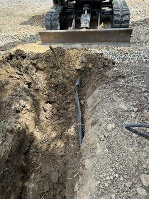 Ripped main irrigation line that master excavation just buried.