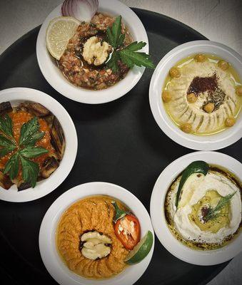 Mezze (clockwise from top): ezme, hummus, kabak, muhammara, shakshuka