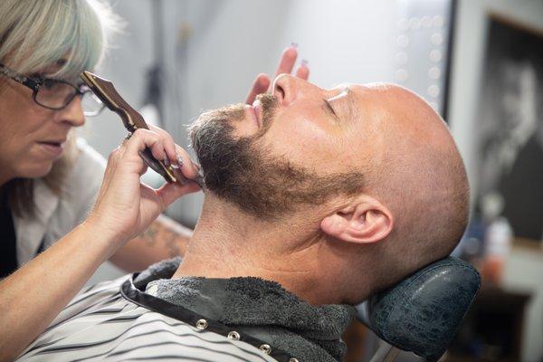 A hot towel straight razor shave is an AMAZING way to "treat yo' self"!