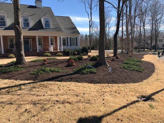 Hand spread mulch job