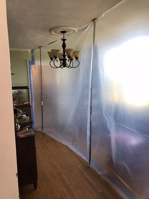 Containment for a Mold mitigation separating home from impacted area.