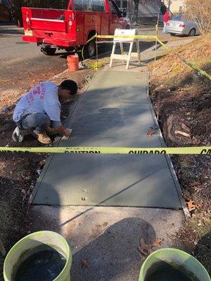 Schlaefer Masonry laying our sidewalk.