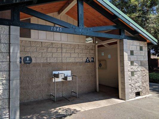 Bathrooms with water fountain and changing tables