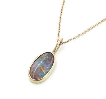 Boulder Opal 18k yellow Gold