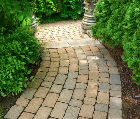 Masters at hardscaping, Artistic Landscapes creates magical walkways through gorgeous gardens for year-round pleasure.