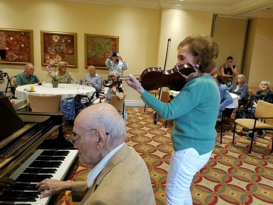 My FIL and one of the residence's (on the violin)