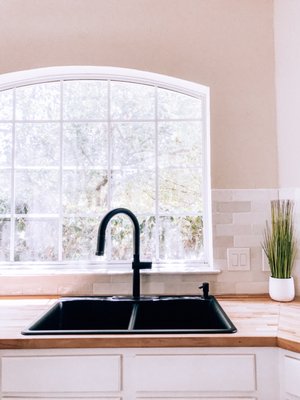 Johnny installed new sink, faucet, and garbage disposal.