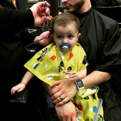 Getting his haircut by the best since day one ! #first cut