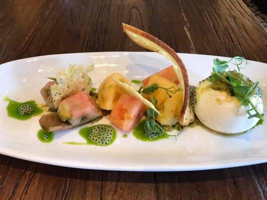 Mozzarella Burrata Salad
Tomato Basil Pesto- Baby Heirloom Tomatoes- Tomato Vinaigrette- Basil Seed- Parmesan Crisp- Basil Oil- Crostini