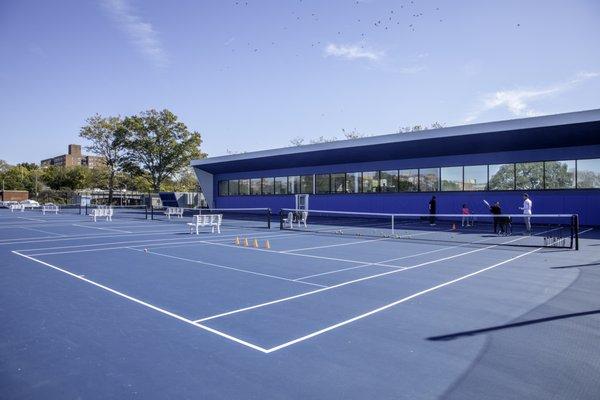 6 newly resurfaced tennis courts with 60-foot lines.