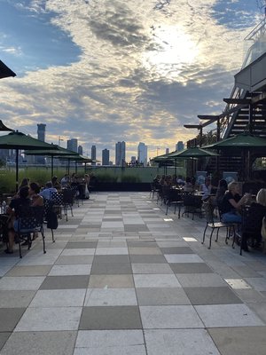 Plenty of room to spread out, enjoy a cocktail or glass of wine by the water, and get some much needed fresh air on our extended patio!