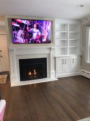 Custom cabinets and mantel.