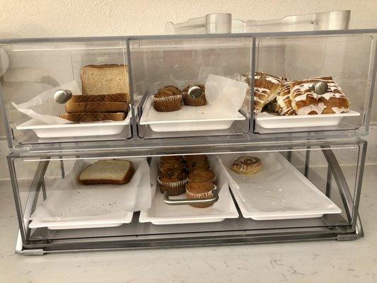 Free breakfast includes bread, muffins, cinnamon rolls & danishes