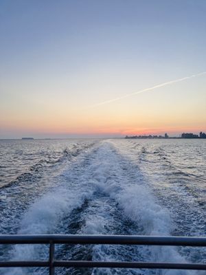 View of back of boat leaving Brooklyn navy yard toward Rockaway