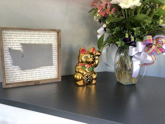 We love our Maneki Neko! Given to us by our former patient - we feel loved and lucky!