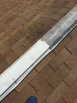 Trim on an asphalt shingle roof before and after pressure washing to remove algae/mildew and grime.