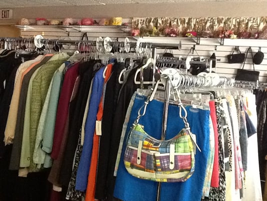 Business casual, dressy dresses, pants and jeans, many tops and jackets. Sizes 0-2x