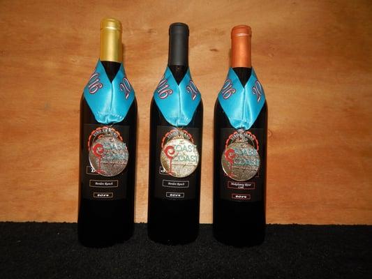 Wine medals from Toast of the Coast wine competition: Sangiovese won gold, Syrah and Barbera won silver.