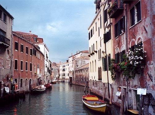 Visit  a city  you get around by long walks and a Gondola  Ride