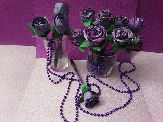 A purple rose symbolizes enchantment, or love at first sight.