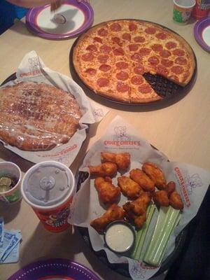 Pizza, cinnamon sticks, and hot wings