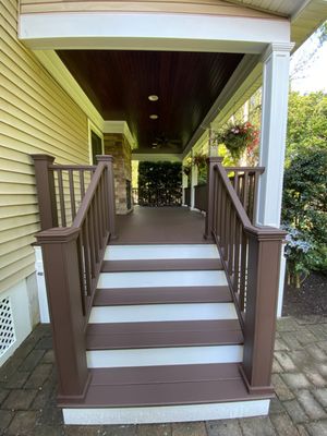 Deck restoration. Deck, columns, and ceilng stripped and refinished. Steps rebuilt to match, entire lower area rebuilt with Azek trim.