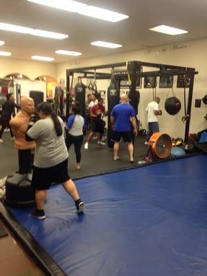 Working out on punching bag